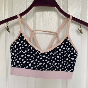 White fox boutique black and white spot sports bra Size XS.